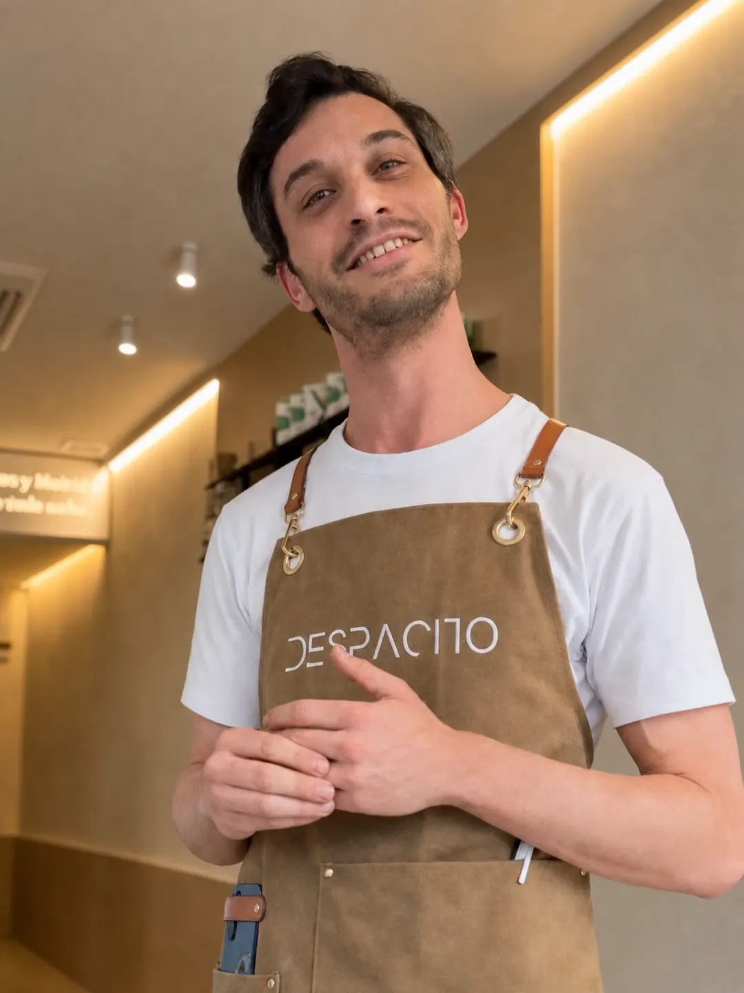 Despacito barista smiling in the coffee shop