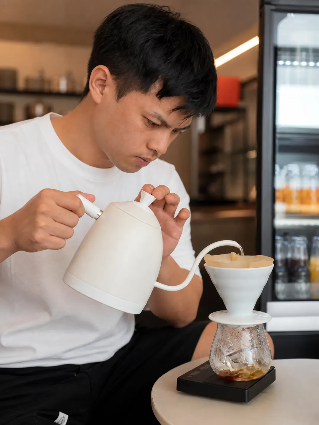 Barista preparing filter coffee at Despacito
