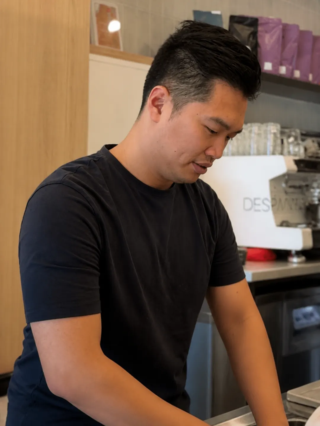 Team member working behind the coffee bar
